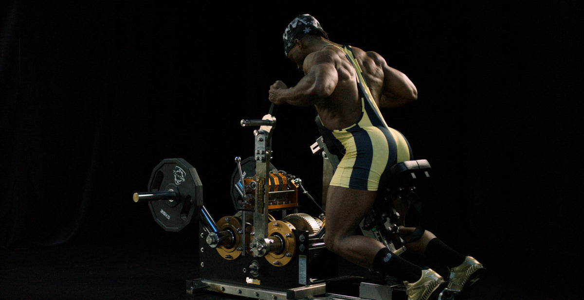 An athlete training on a Mechanical Evolution machine